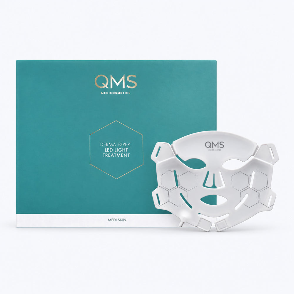 QMS Derma Expert LED Light Treatment gezichtsmasker met de originele verpakking, voor lichtbehandeling thuis.